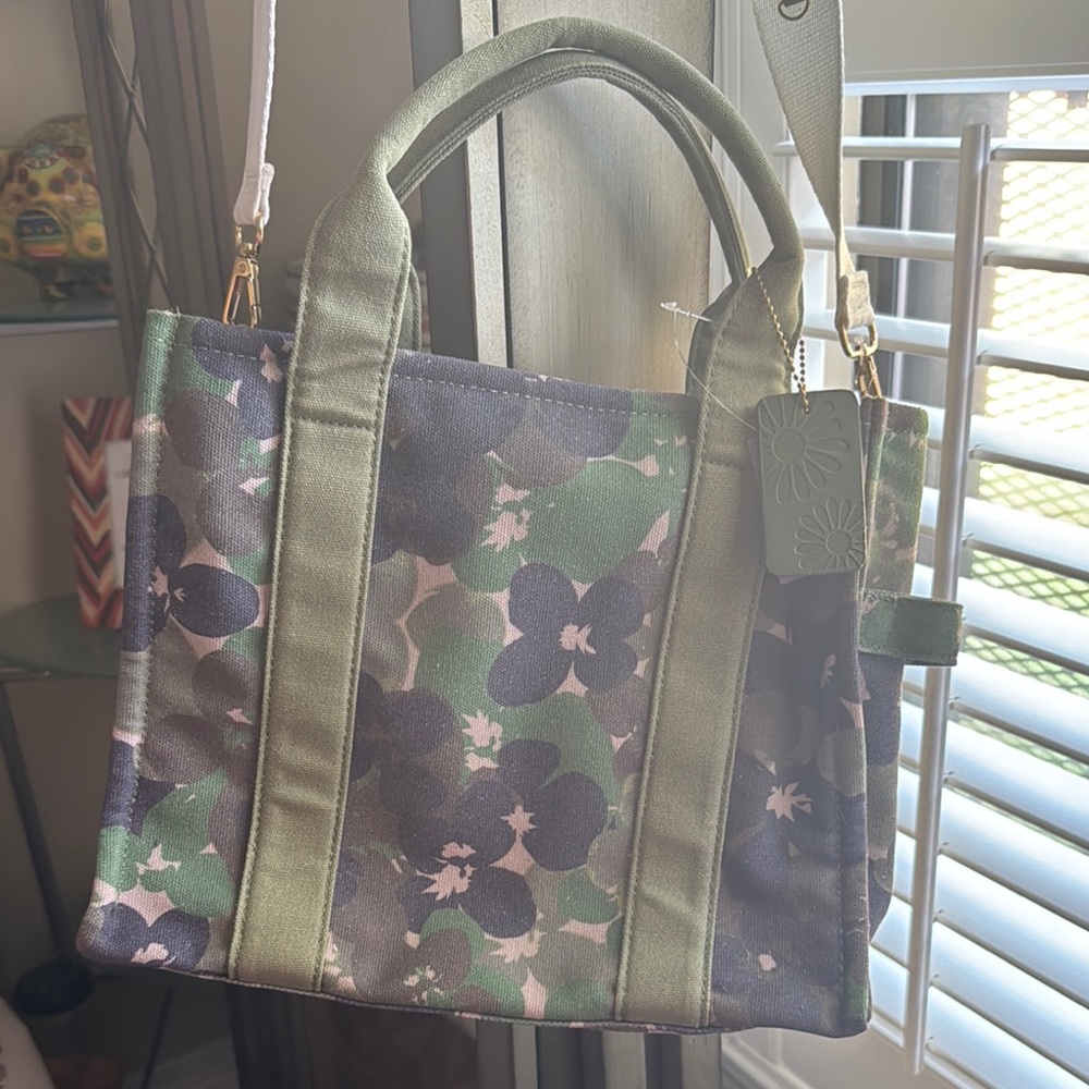 NWTs Floral Canvas Tote Bag with D rings and adjustable strap.